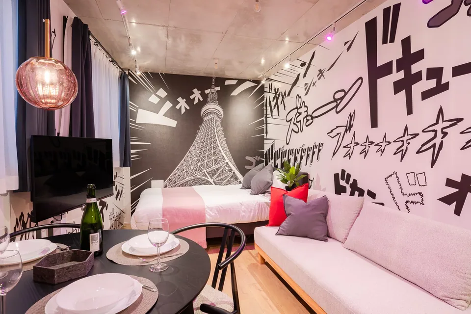 SB11 living room with manga-style artwork and pink lighting